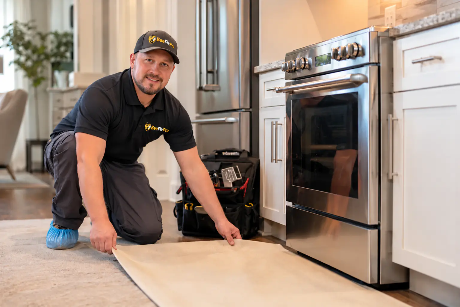 BeeFixPro technician preparing an oven for professional service